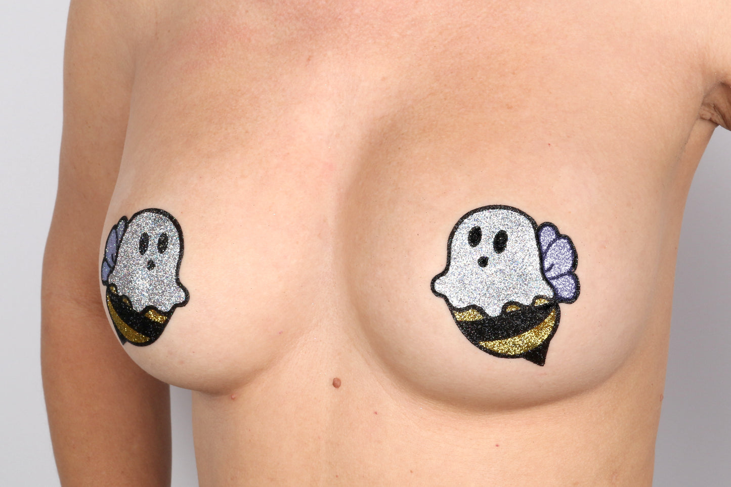 Model Image - Boo Bees Glitter Pasties applied to bust of female model