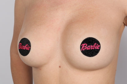 Model Image - Neon Pink Barbie Glitter Pasties applied to bust of female model