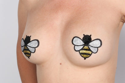 Model Image - Bee Glitter Pasties applied to bust of female model