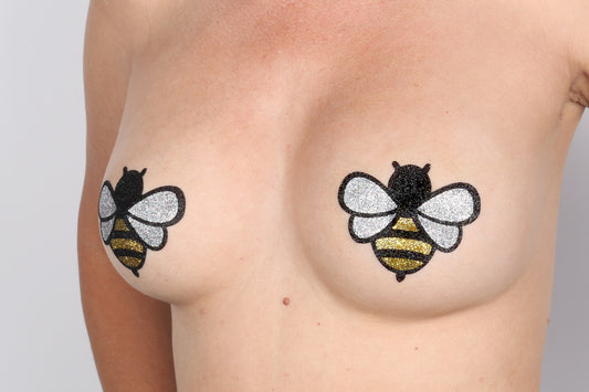 Model Image - Bee Glitter Pasties applied to bust of female model