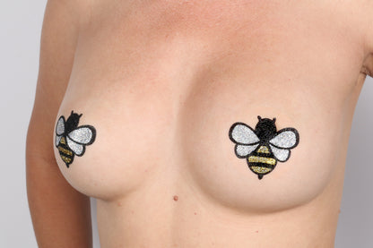 Model Image - Small Bee Glitter Pasties applied to bust of female model
