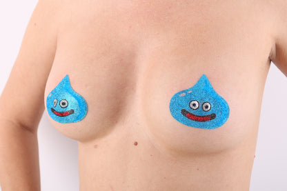 Model Image - Blue Slime Glitter Pasties applied to bust of female model