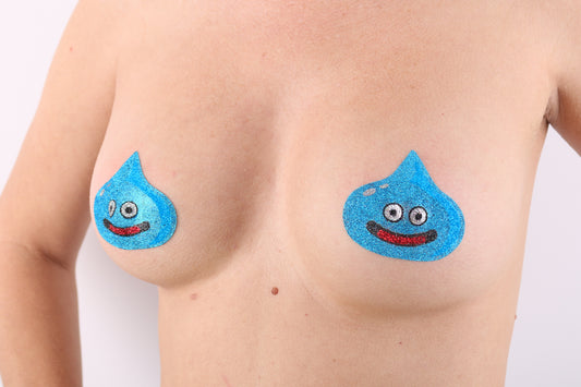 Model Image - Blue Slime Glitter Pasties applied to bust of female model