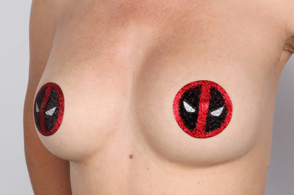 Model Image - Death Puddle Glitter Pasties applied to bust of female model